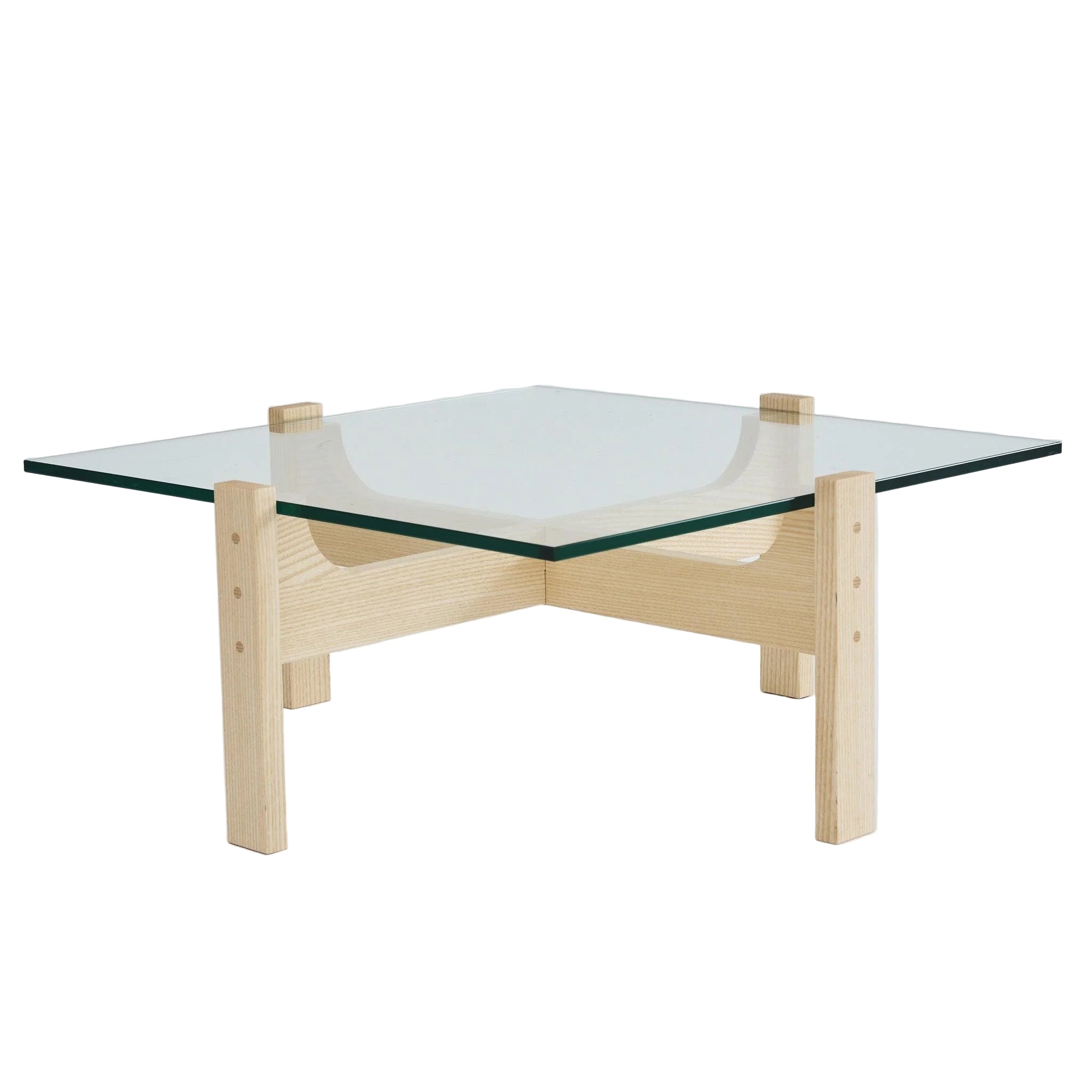 Glass coffee table with wooden frame on a white background